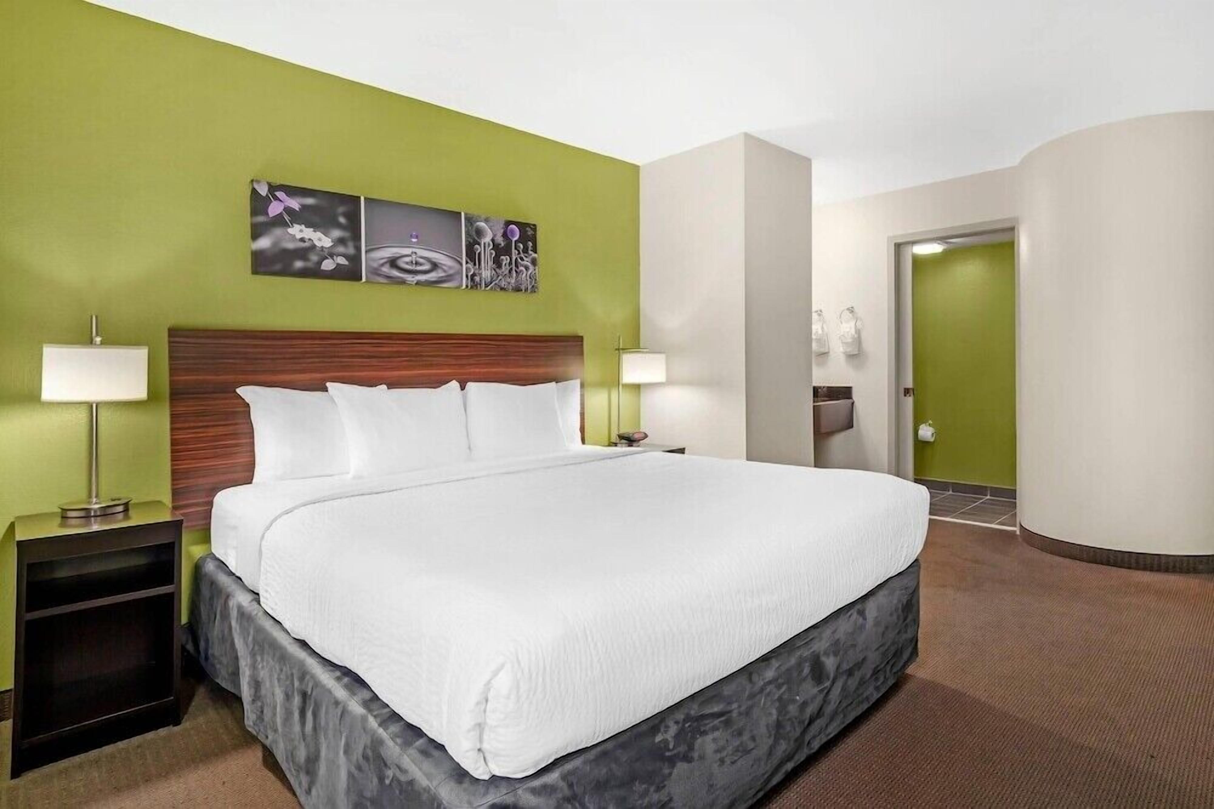 Premium bedding, desk, blackout drapes, iron/ironing board