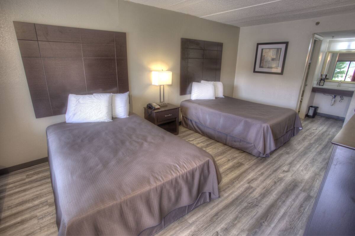 Standard Room, 2 Double Beds, Smoking | Pillowtop beds, desk, laptop workspace, free WiFi
