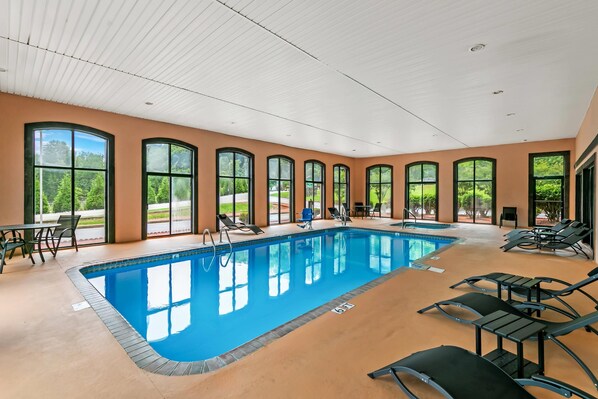 Indoor pool, open 10:00 AM to 10:00 PM, pool loungers