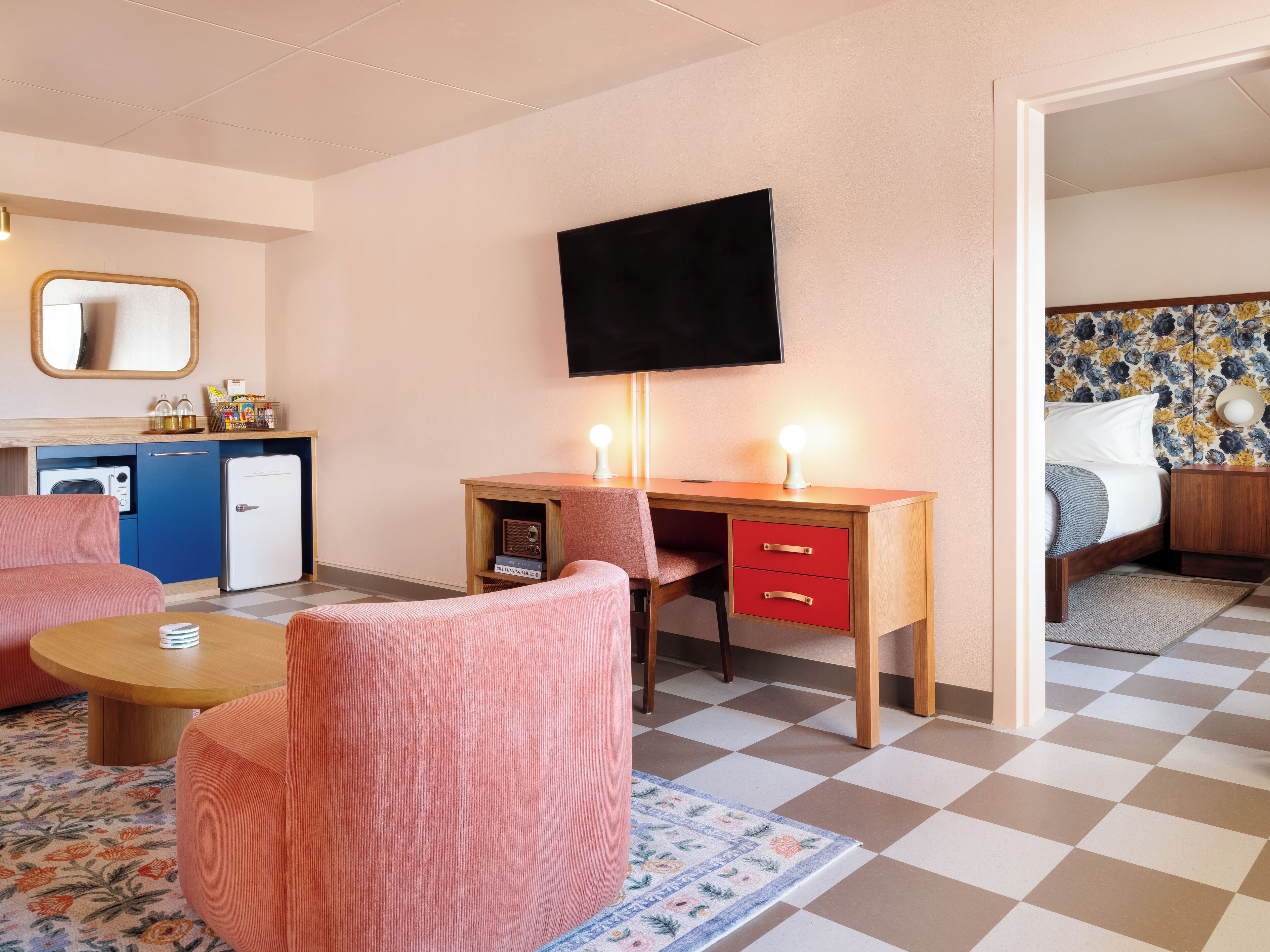 50-inch flat-screen TV with cable channels, smart speakers