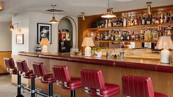 Cocktail bar, poolside views, open daily
