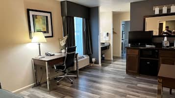 Suite, 1 King Bed, Non Smoking, Refrigerator & Microwave (with Single Sofabed) | Down duvets, in-room safe, desk, iron/ironing board