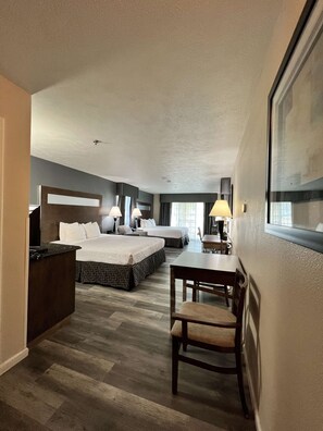 Standard Room, Multiple Beds, Non Smoking, Balcony | Down comforters, in-room safe, desk, iron/ironing board