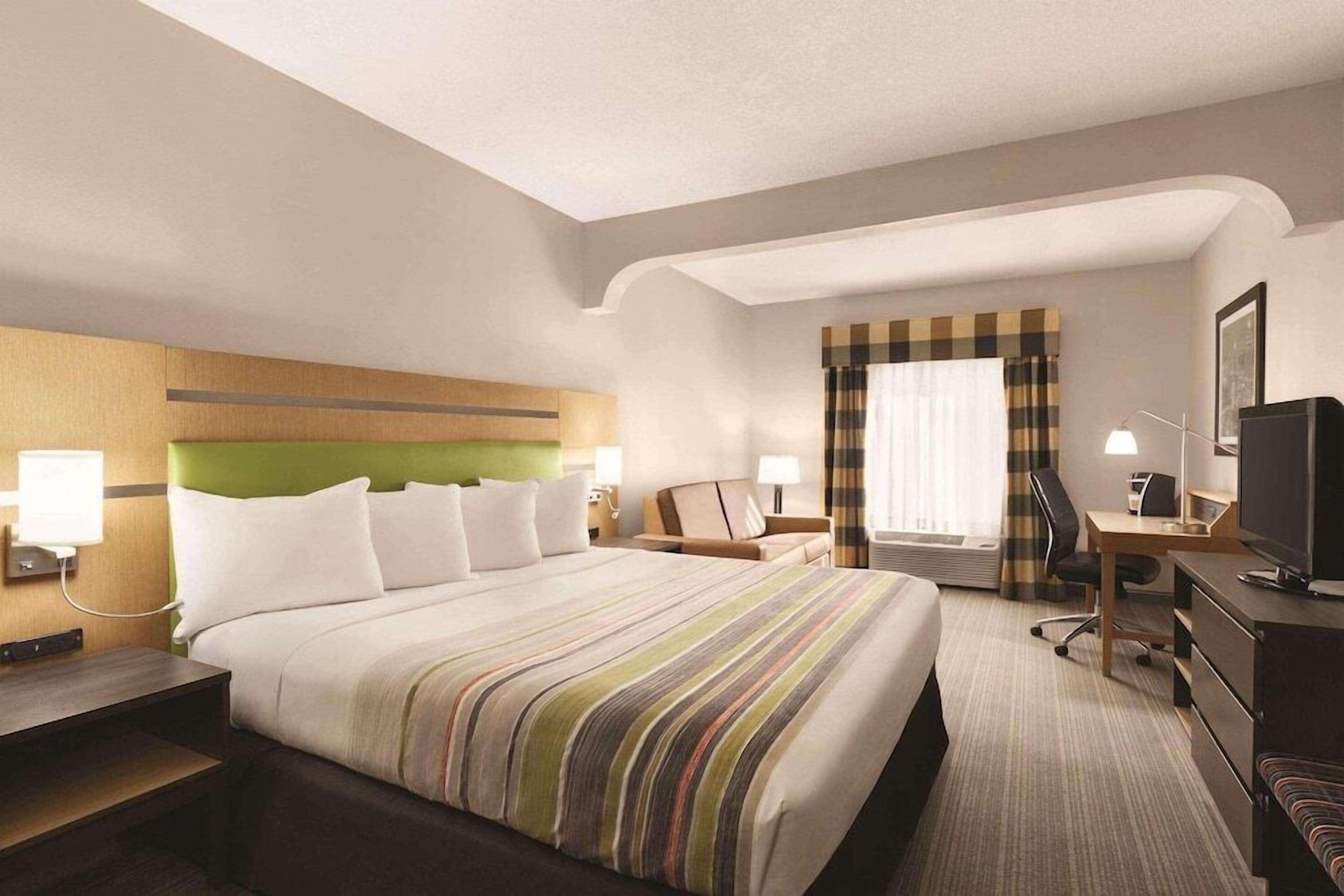 In-room safe, desk, iron/ironing board, free cribs/infant beds