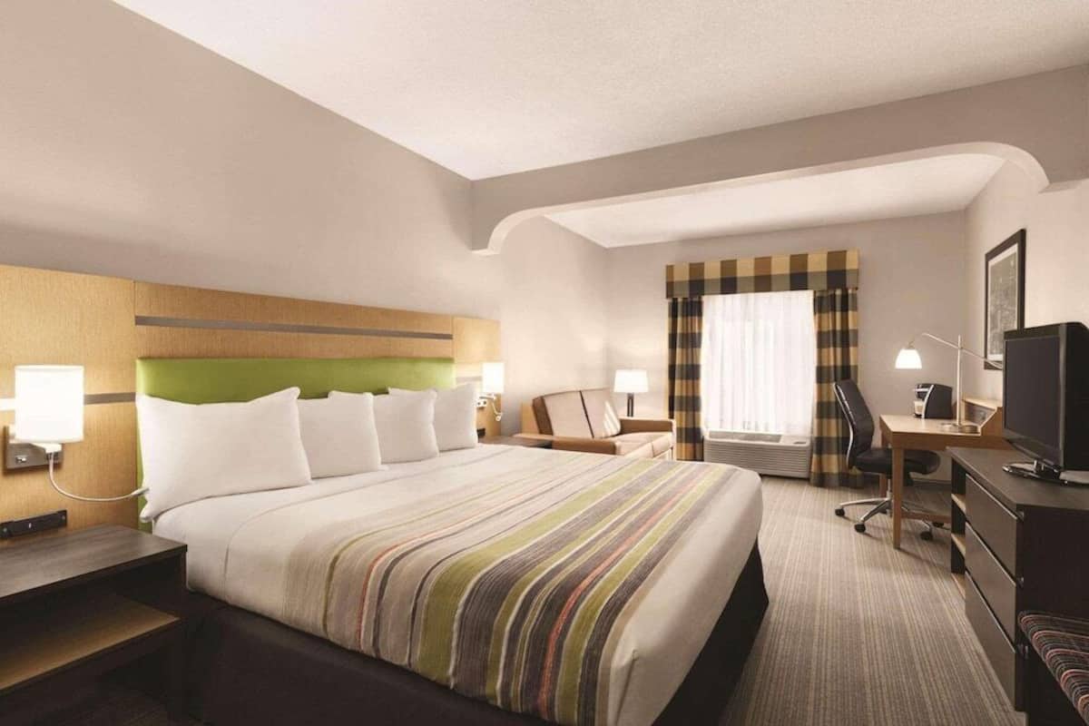 In-room safe, desk, iron/ironing board, free cribs/infant beds
