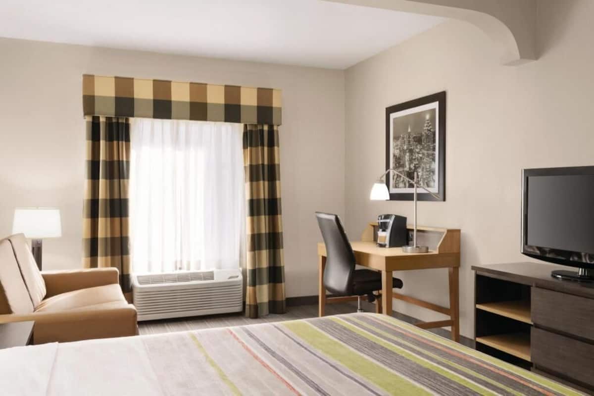 In-room safe, desk, iron/ironing board, free cribs/infant beds