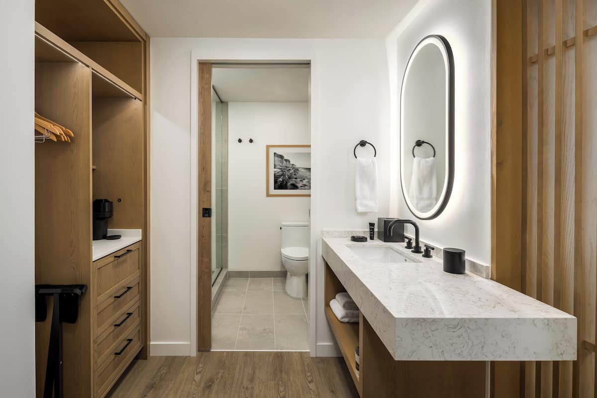 Combined shower/tub, designer toiletries, hair dryer, bathrobes