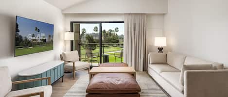 Hypo-allergenic bedding, down duvets, desk, laptop workspace