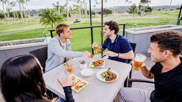 Breakfast, lunch, dinner served; golf course views