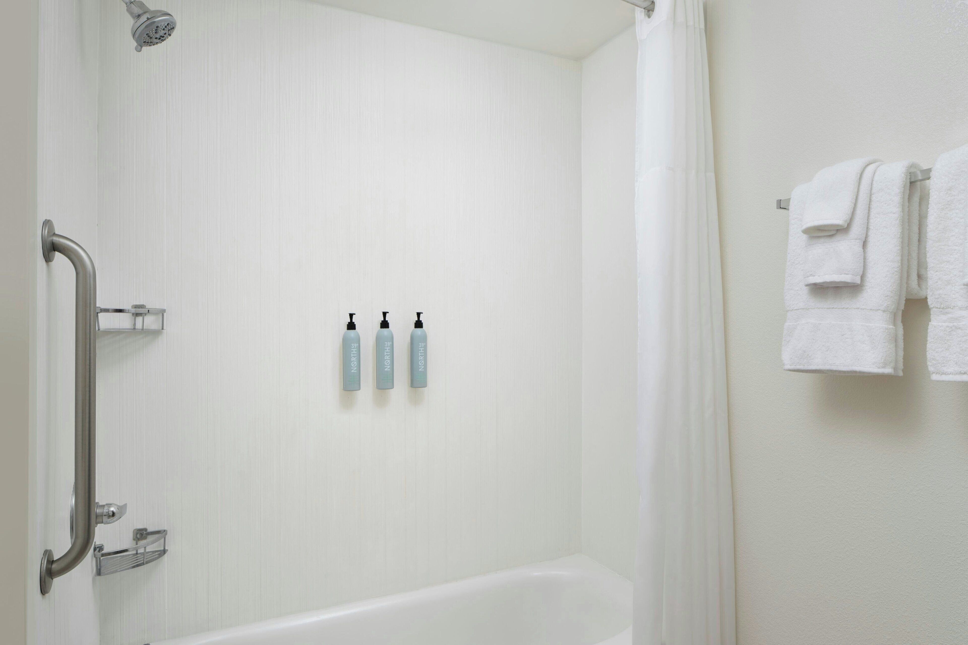 room, 2 queen beds | bathroom | combined shower/bathtub, free toiletries, hair dryer, towels