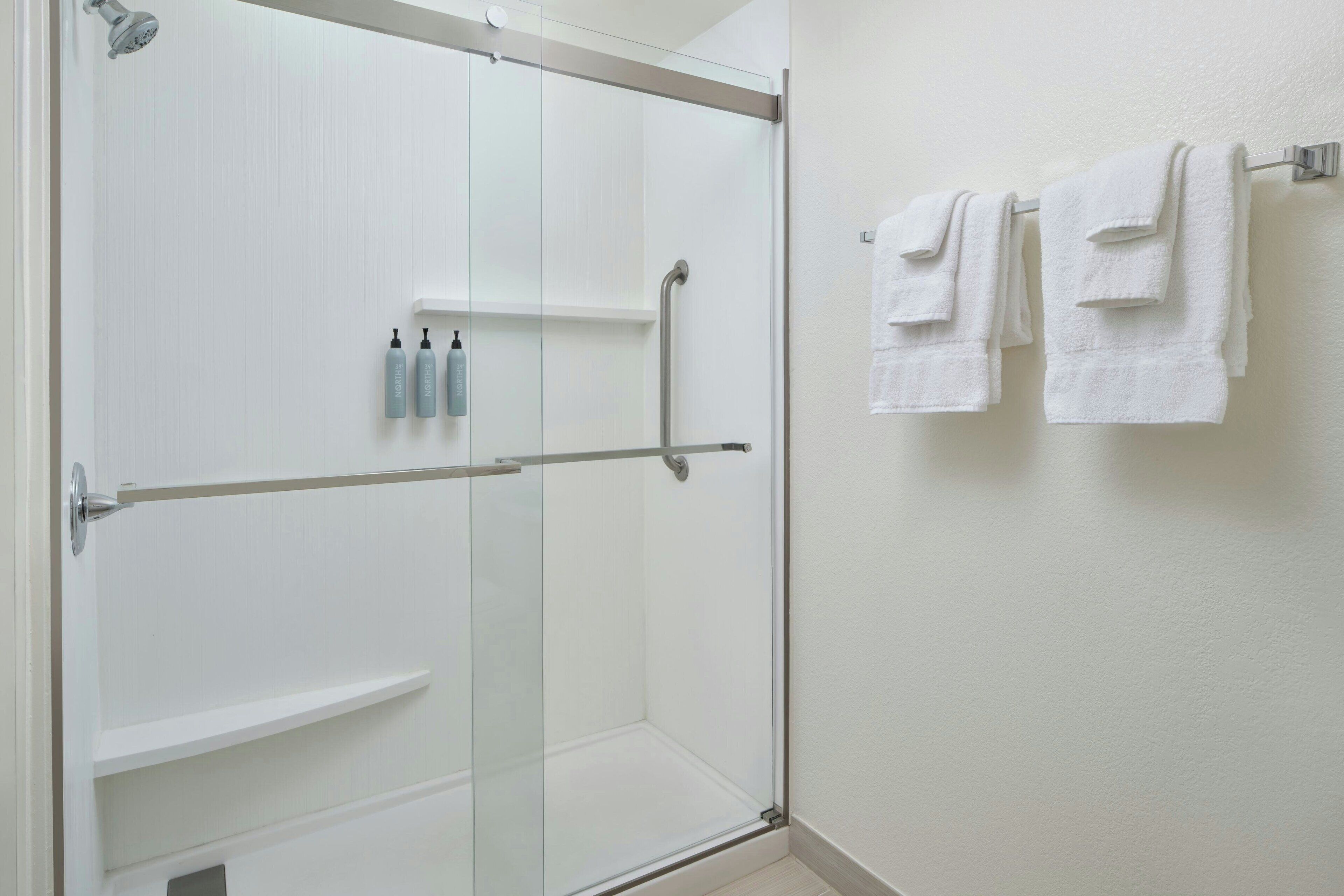 combined shower/bathtub, free toiletries, hair dryer, towels