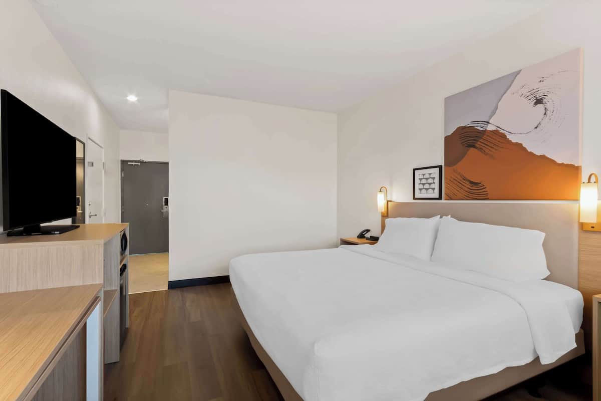 Premium bedding, blackout drapes, iron/ironing board, free WiFi