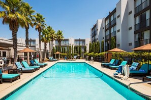Outdoor pool, open 8:00 AM to 10:00 PM, pool umbrellas, sun loungers