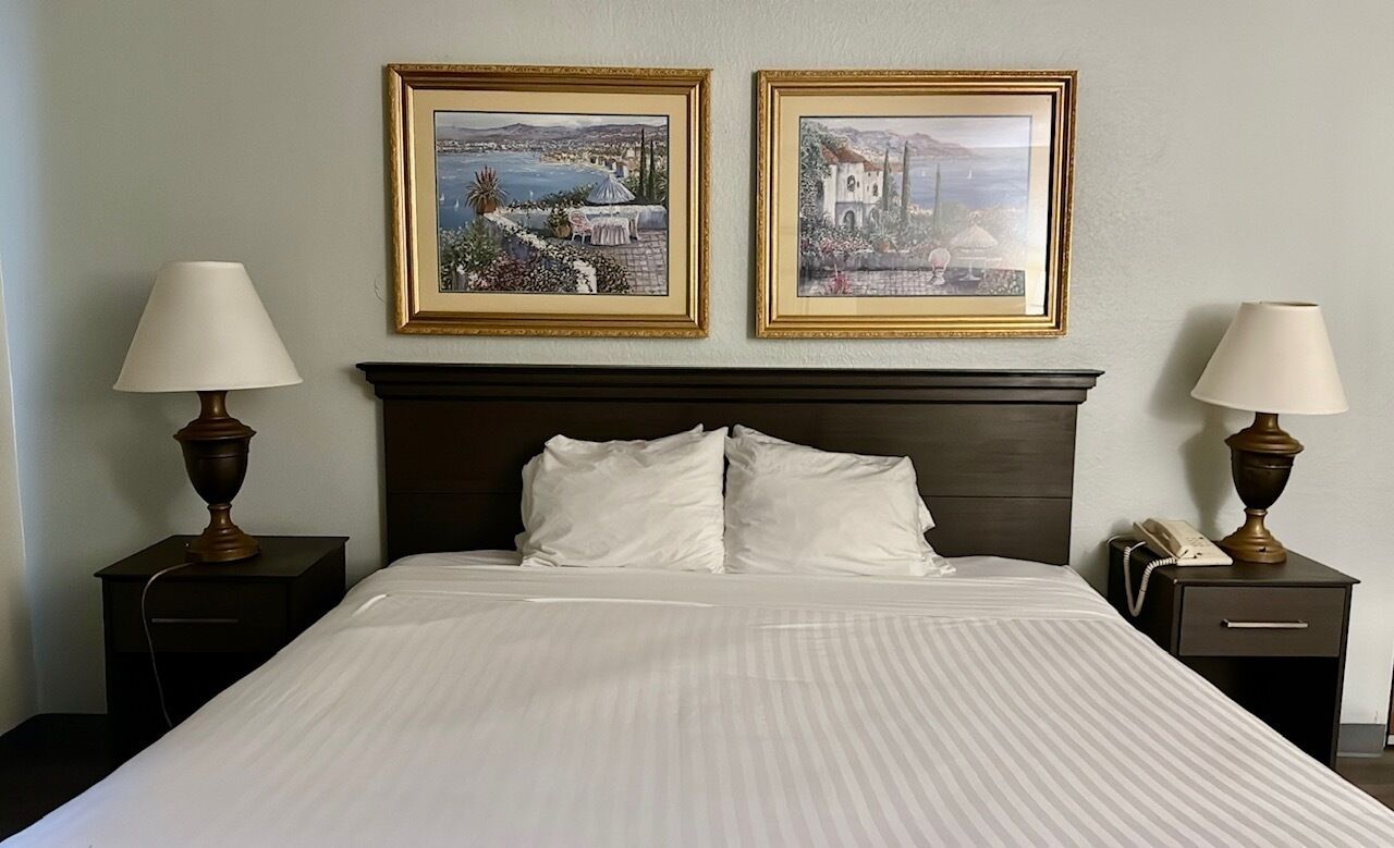 Basic Room, 1 King Bed | Desk, blackout drapes, iron/ironing board, free WiFi