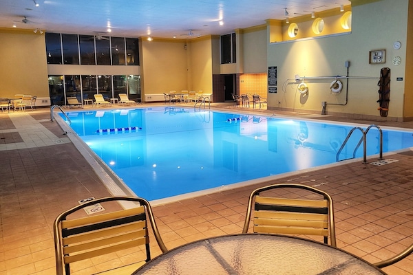 Indoor pool, open 6:00 AM to 11:00 PM, sun loungers