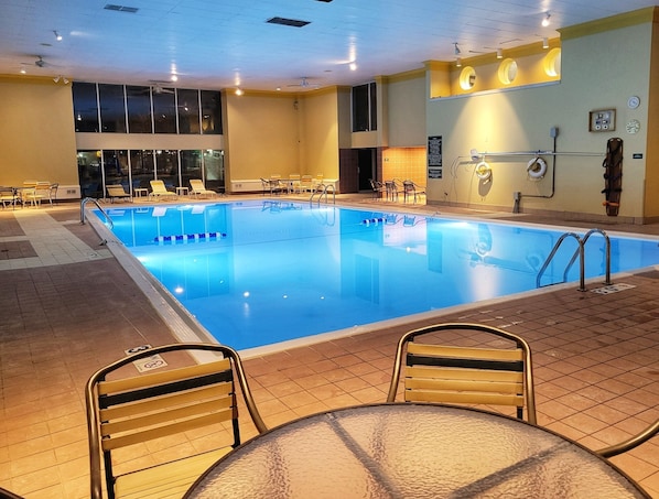 Indoor pool, open 6:00 AM to 11:00 PM, pool loungers