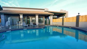 Seasonal outdoor pool, open 10:00 AM to 11:00 PM, sun loungers