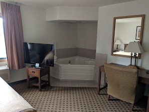 Suite, 1 King Bed with Whirlpool, Non Smoking | In-room safe, desk, laptop workspace, iron/ironing board - Boarders Inn & Suites by Cobblestone Hotels - Ripon (Ripon)