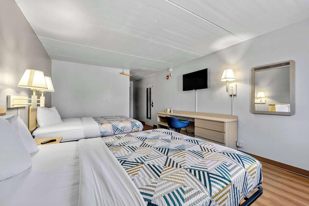 Laptop workspace, free WiFi, bed sheets