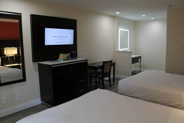 A hotel room with two beds, a desk, a chair, a TV, and a window. - Motel 6 Vallejo, CA – Napa Valley (Vallejo)