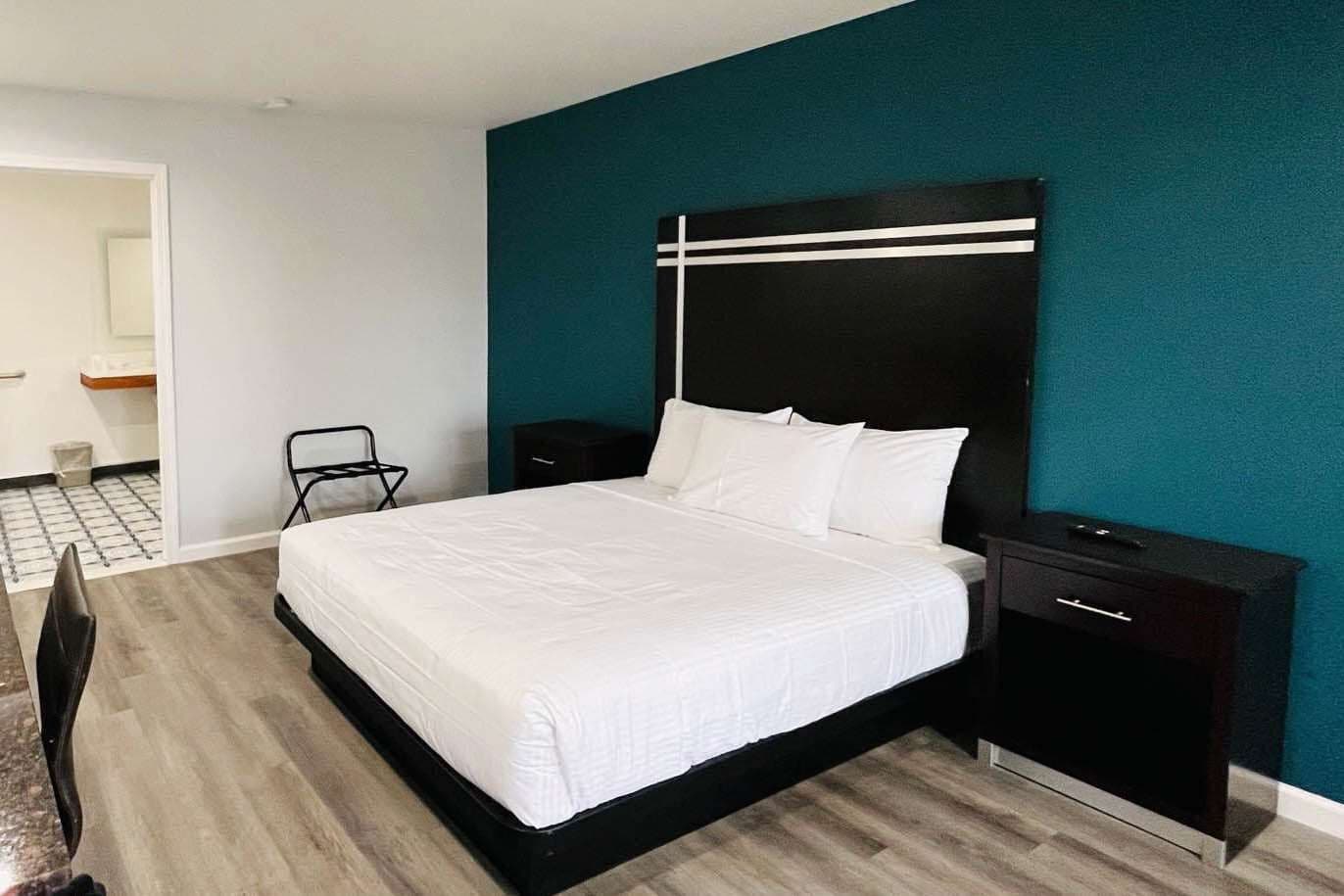 Desk, laptop workspace, free WiFi, bed sheets