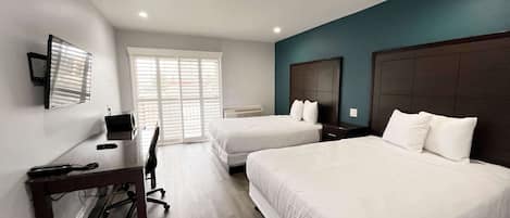 Desk, laptop workspace, free WiFi, bed sheets