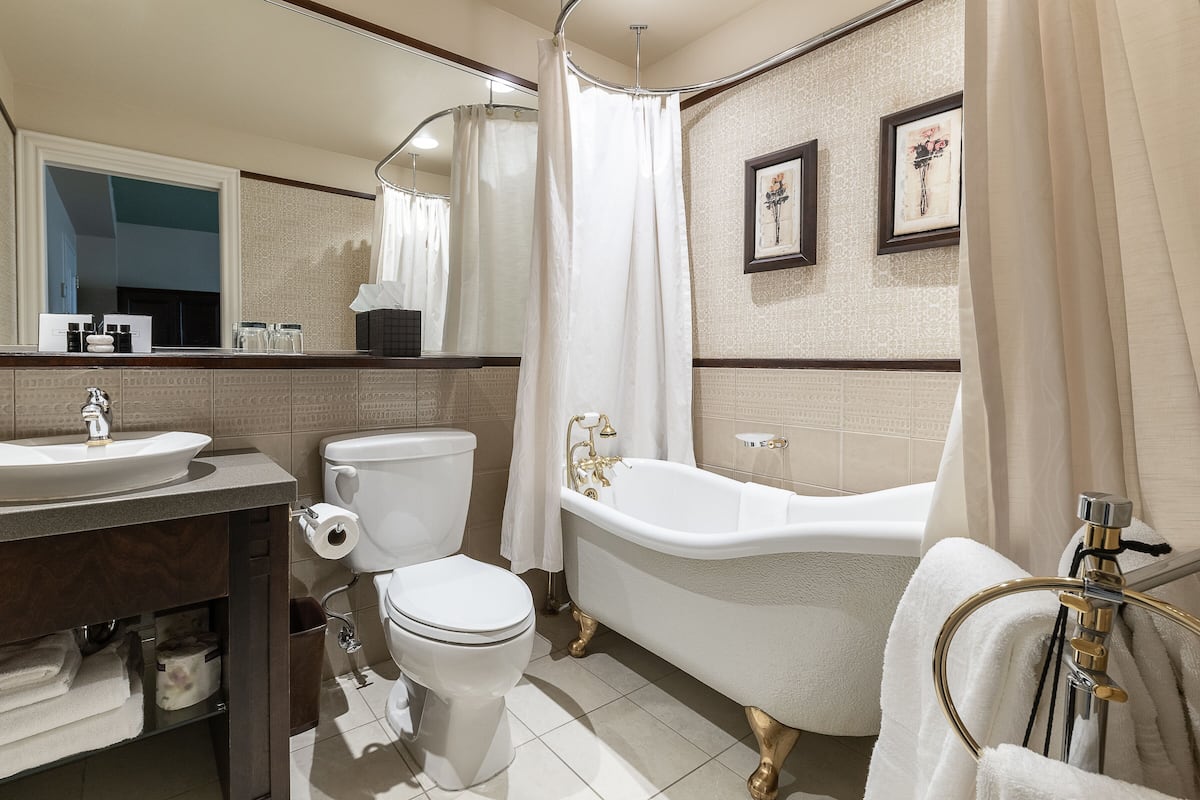 classic room, 1 king bed | bathroom | free toiletries, hair dryer, bathrobes, slippers