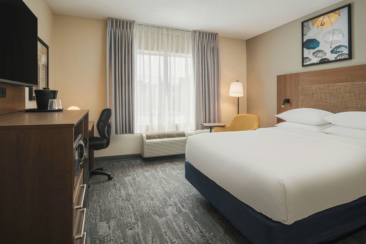 Premium bedding, desk, blackout curtains, iron/ironing board