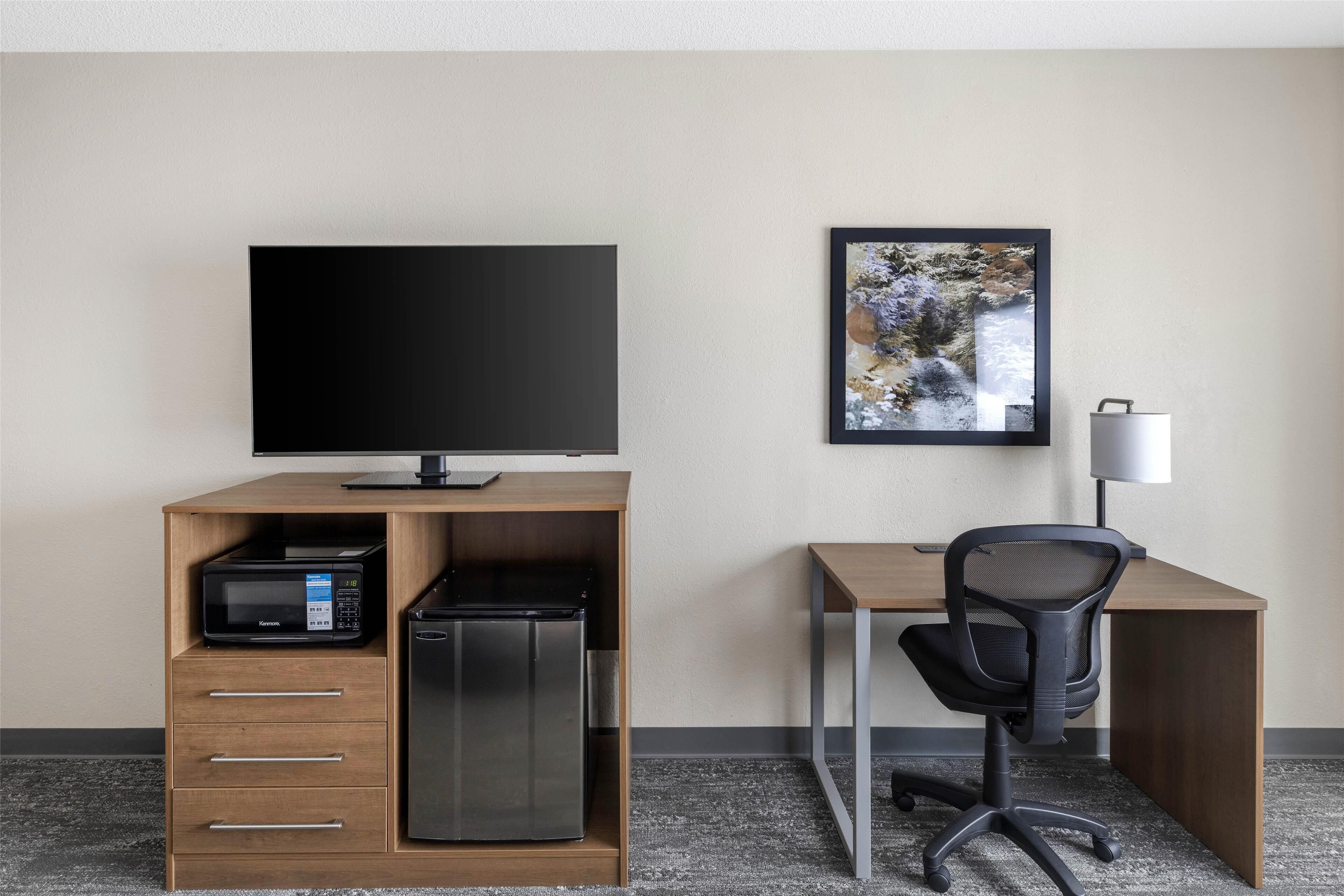 premium bedding, desk, blackout curtains, iron/ironing board