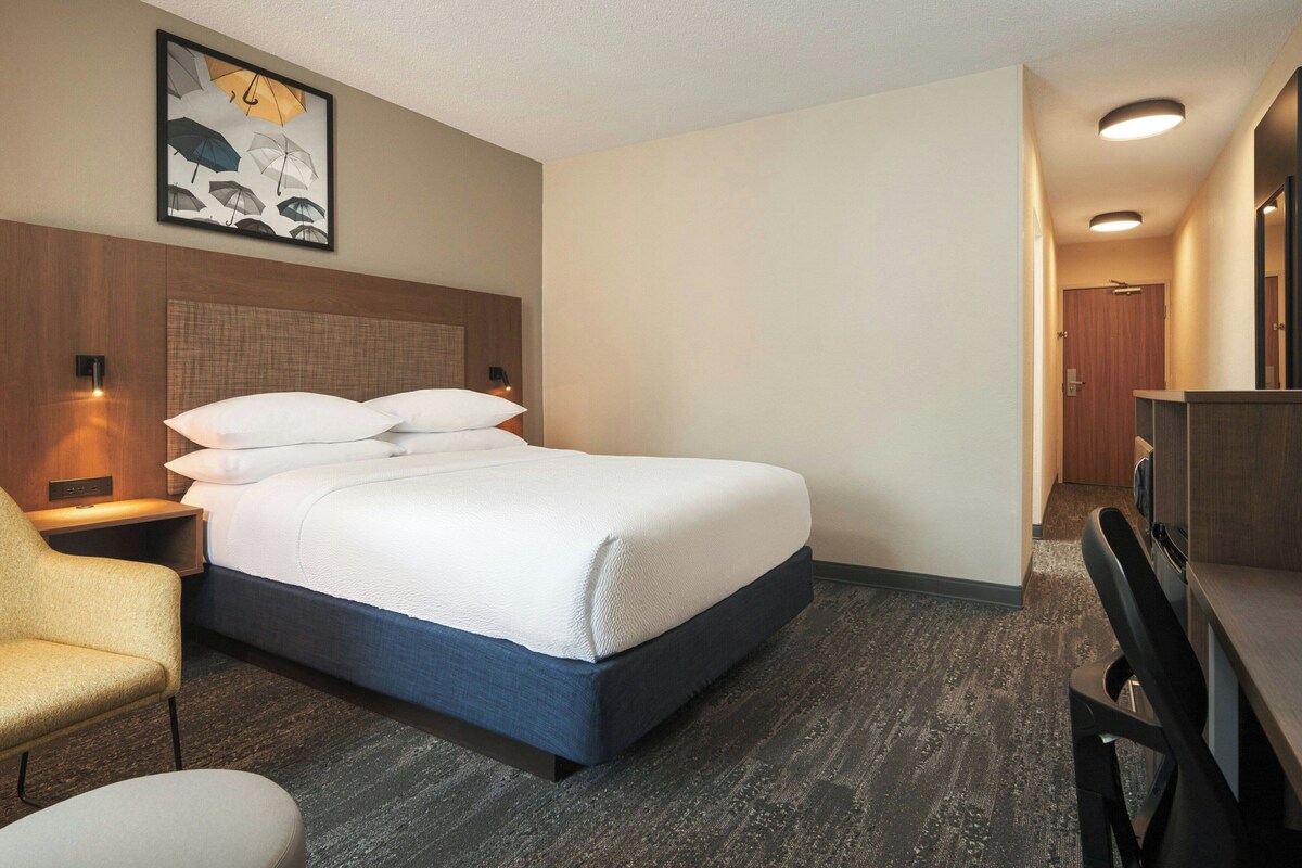 Premium bedding, desk, blackout curtains, iron/ironing board