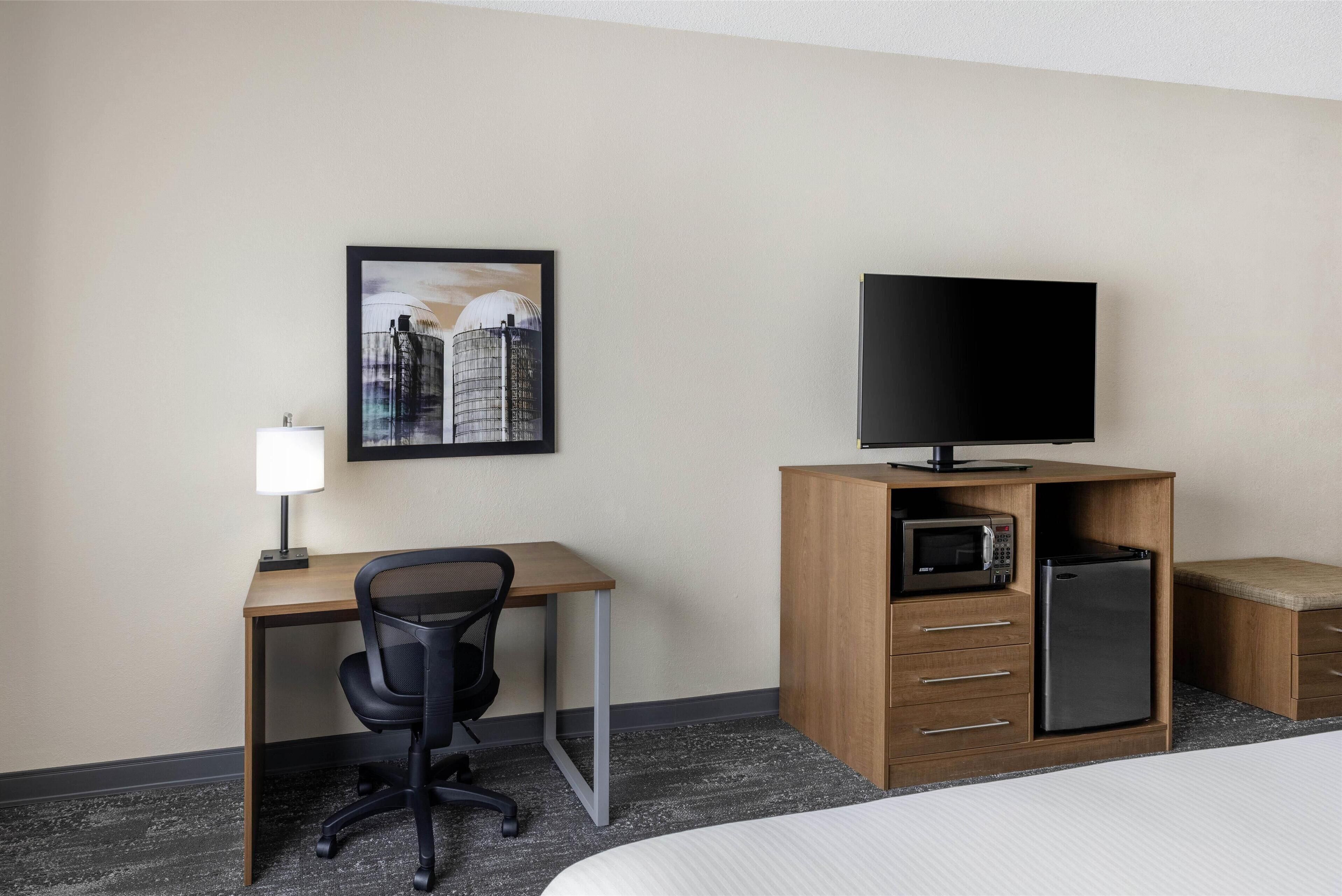 standard room, 1 king bed, non smoking, refrigerator & microwave (with sofabed) | premium bedding, desk, blackout curtains, iron/ironing board