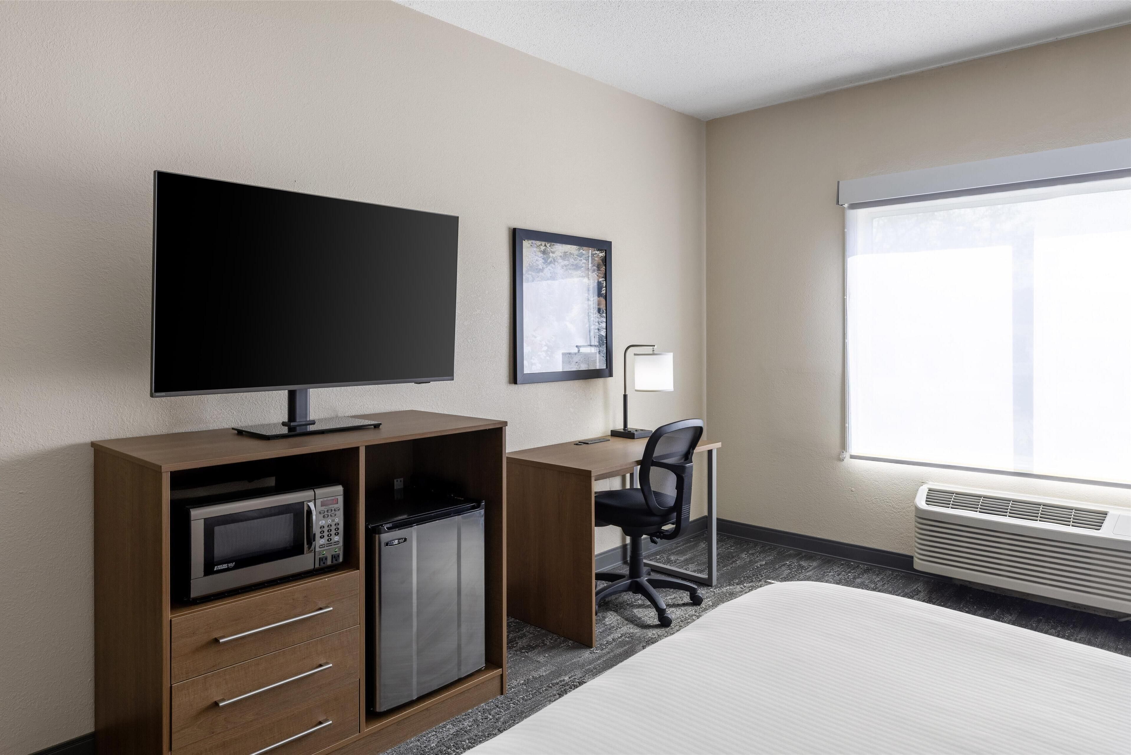 premium bedding, desk, blackout curtains, iron/ironing board