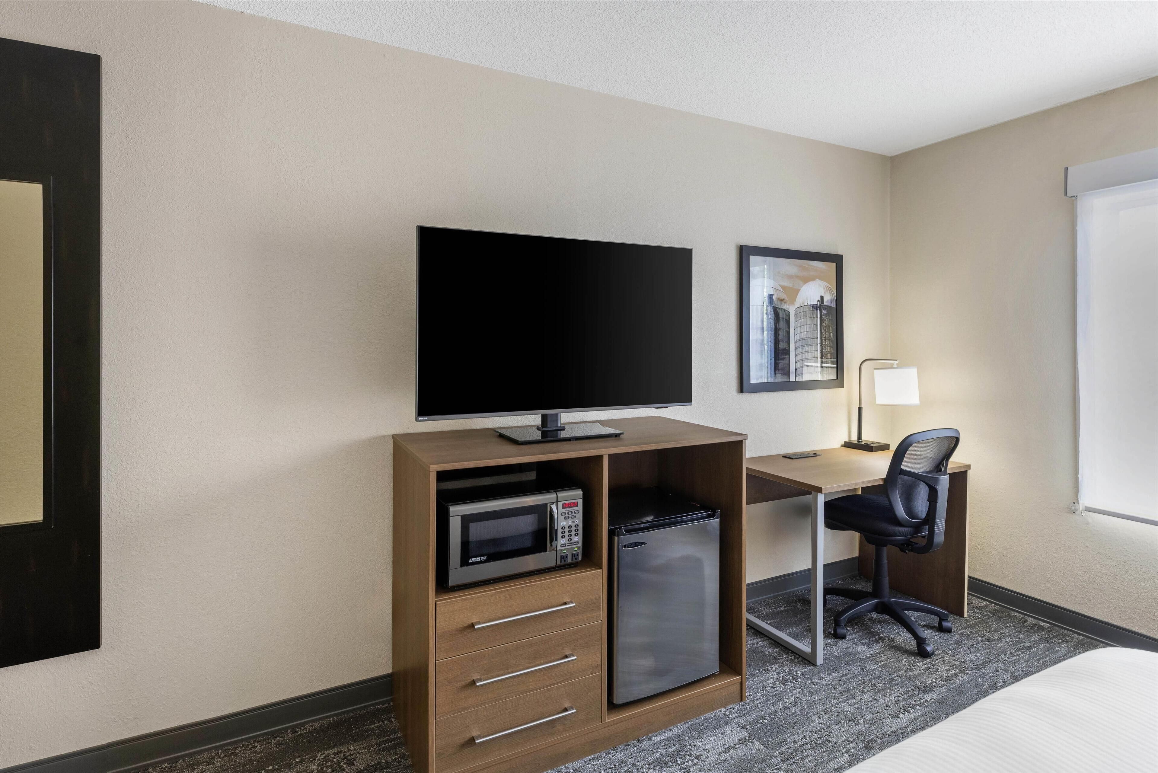 premium bedding, desk, blackout curtains, iron/ironing board