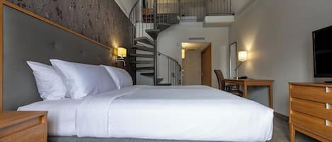 Suite junior | 1 habitación, minibar, caja de seguridad en la habitación y escritorio