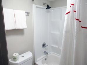 Combined shower/bathtub, hair dryer, towels, soap