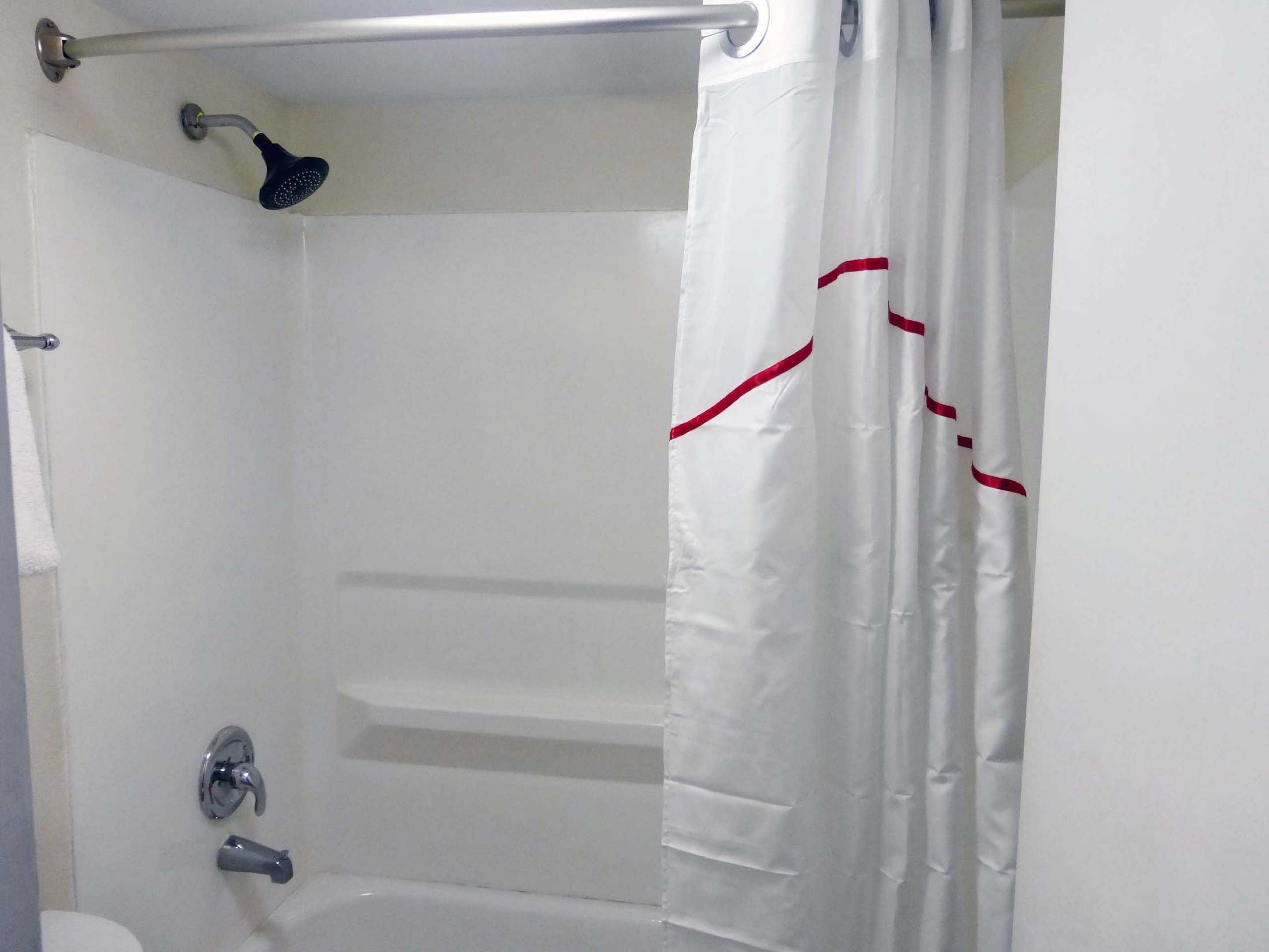 Combined shower/tub, hair dryer, towels, soap