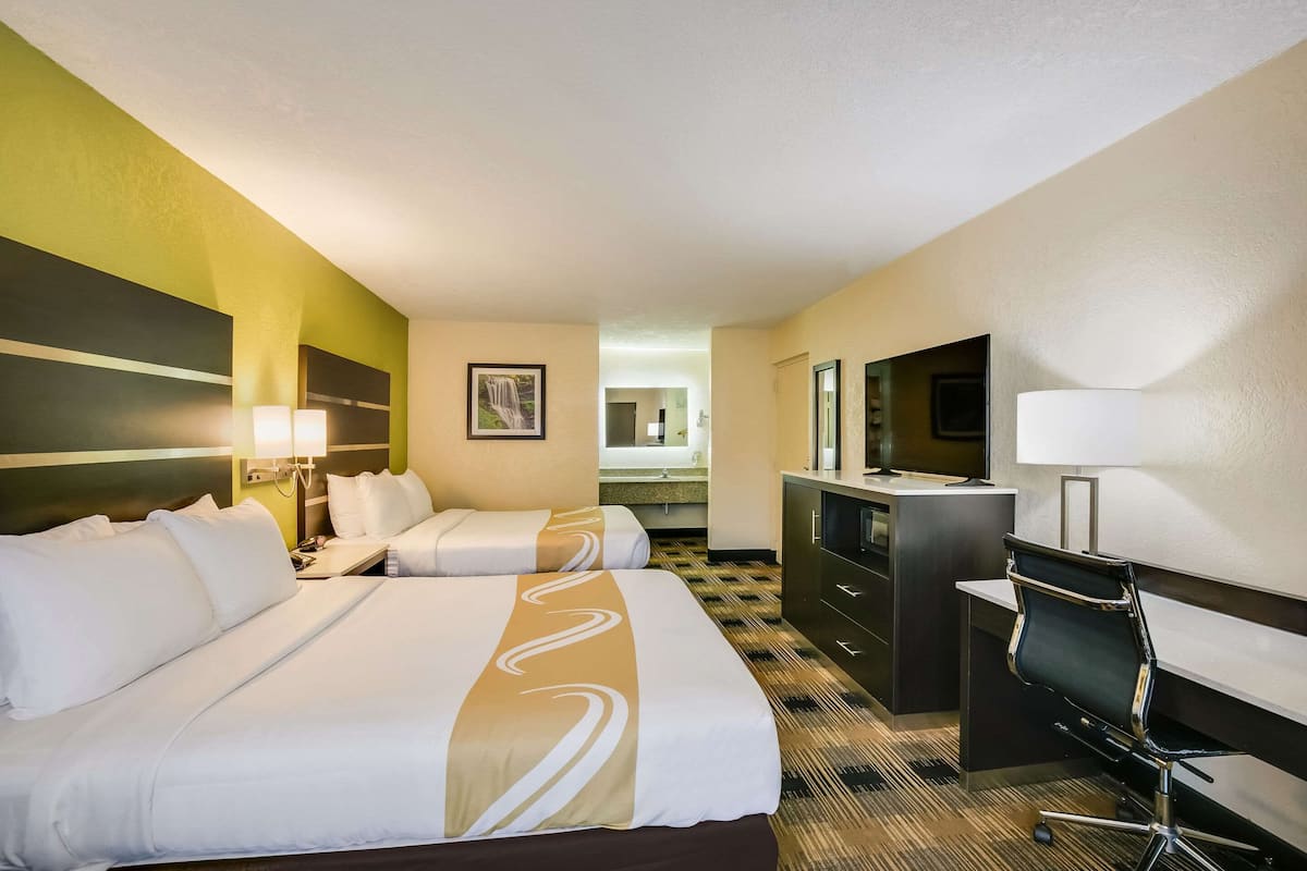 Standard Room, 2 Queen Beds, Non Smoking | Iron/ironing board, WiFi (free), bed sheets