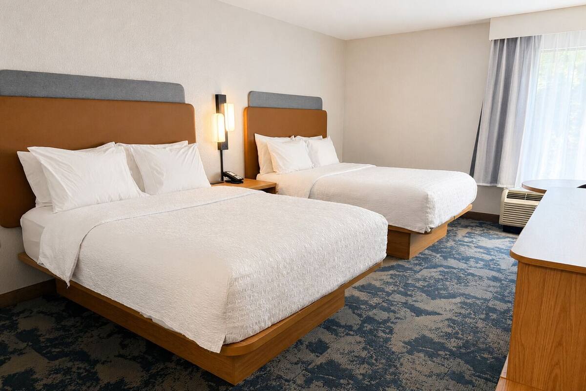 Premium bedding, iron/ironing board, WiFi (free), bed sheets