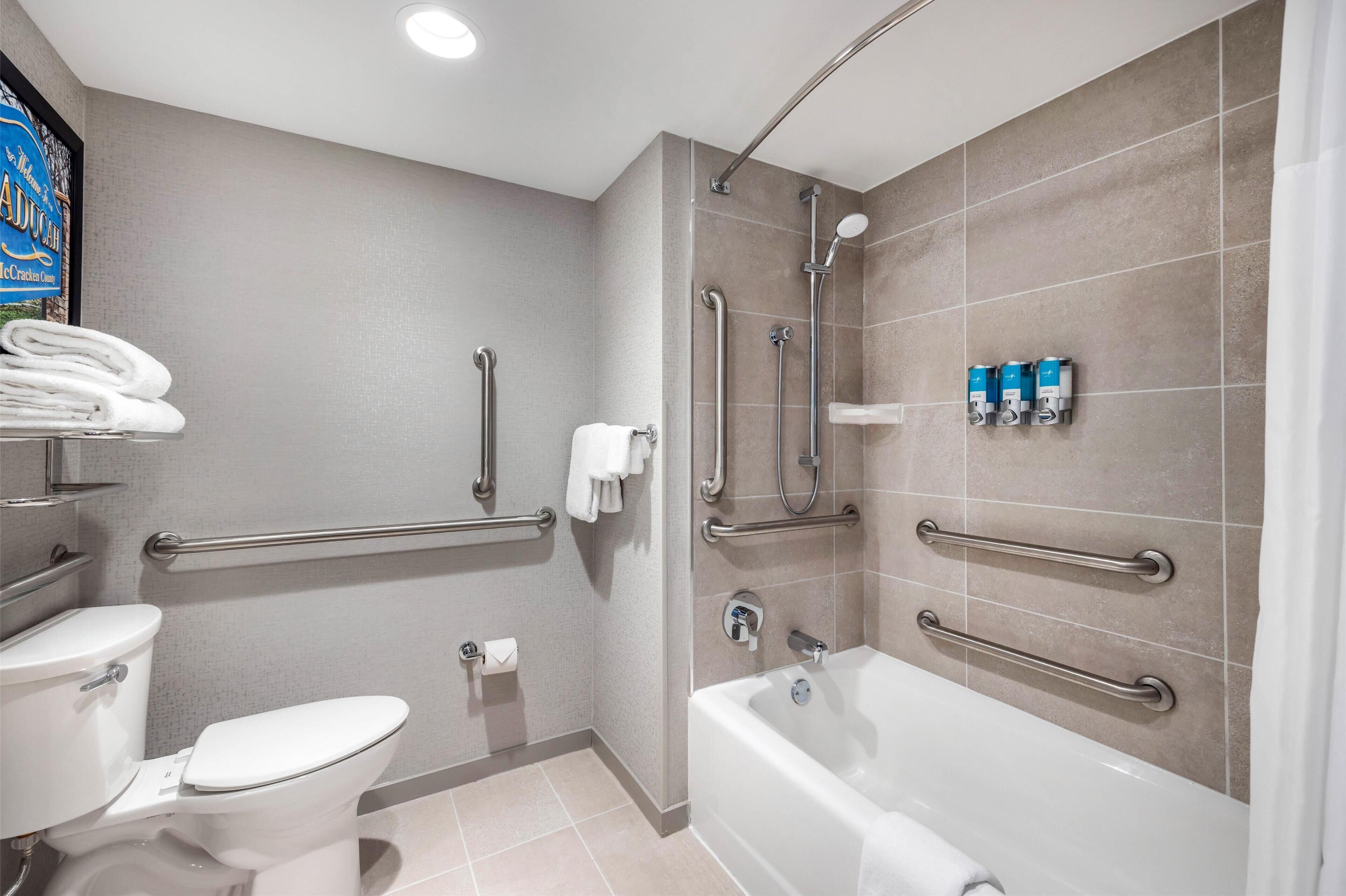 combined shower/bathtub, free toiletries, hair dryer, towels