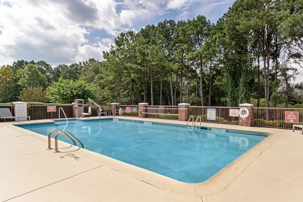 Seasonal outdoor pool, pool umbrellas, pool loungers