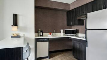 Full-sized fridge, microwave, stovetop, dishwasher