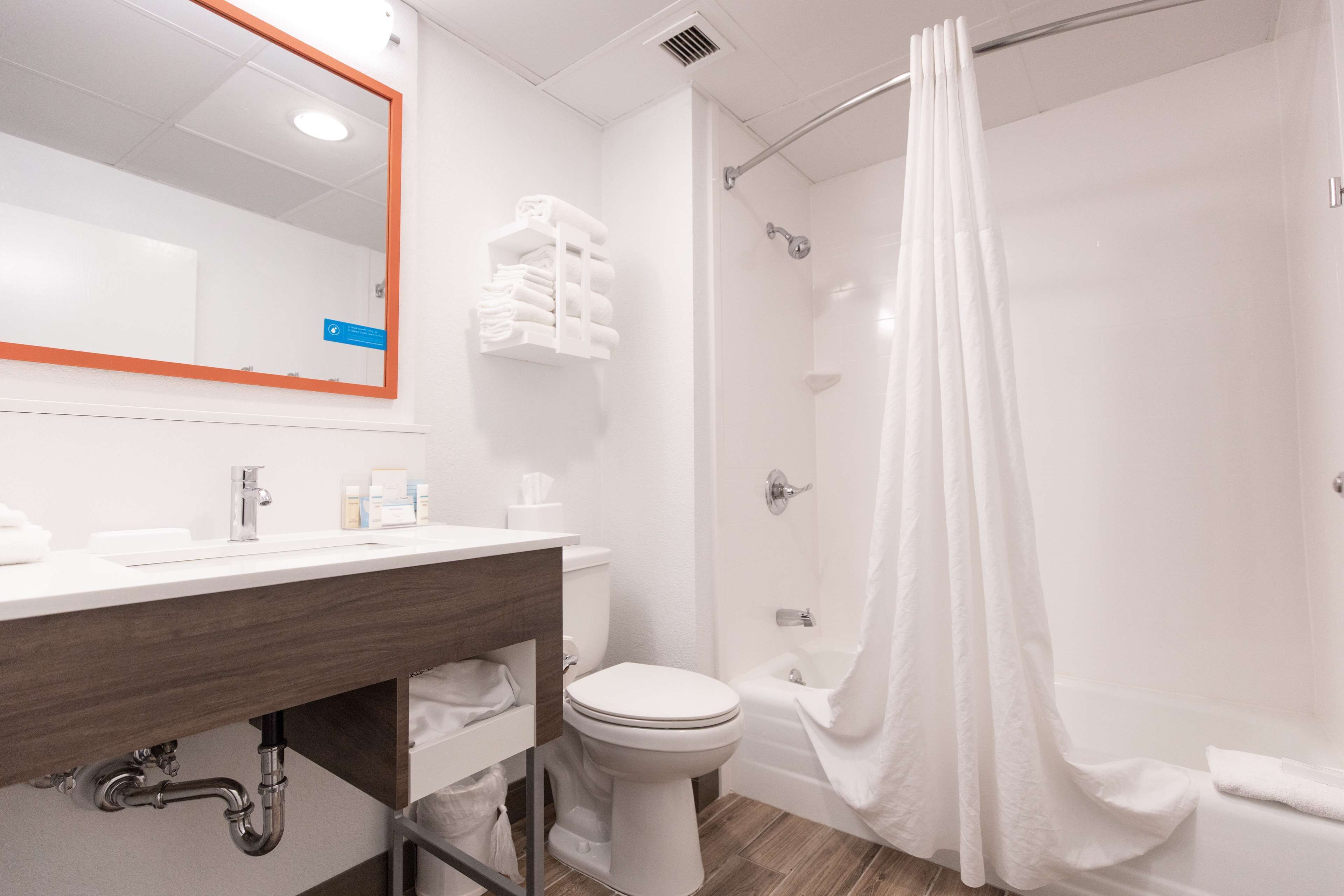 room, 2 queen beds, refrigerator & microwave | bathroom | free toiletries, hair dryer, towels