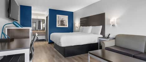 Escritorio, espacio para trabajar con laptop y cortinas blackout