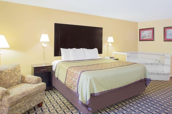 Upgraded, Deluxe Room, 1 King Bed, Non Smoking | In-room safe, desk, iron/ironing board, free cribs/infant beds