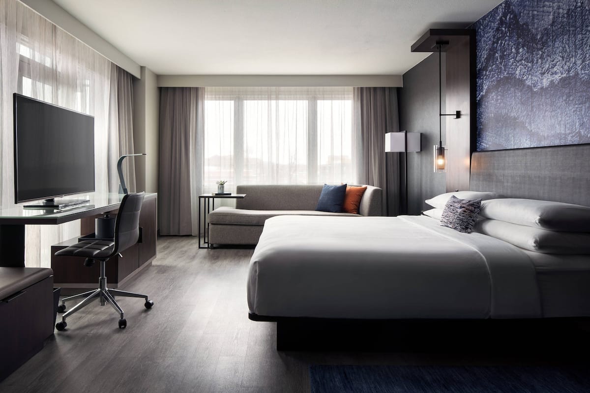 Room, 1 King Bed, Non Smoking, Corner | Premium bedding, down duvets, pillow-top beds, in-room safe