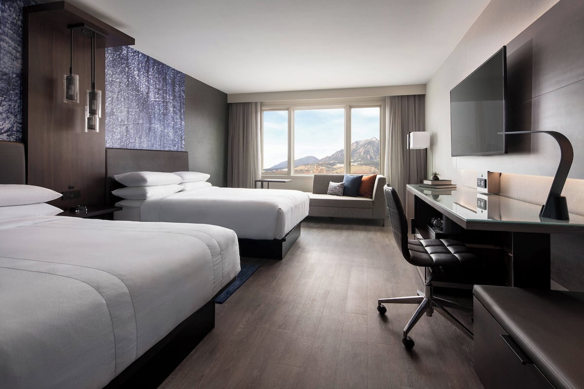 Premium bedding, down duvets, pillow-top beds, in-room safe
