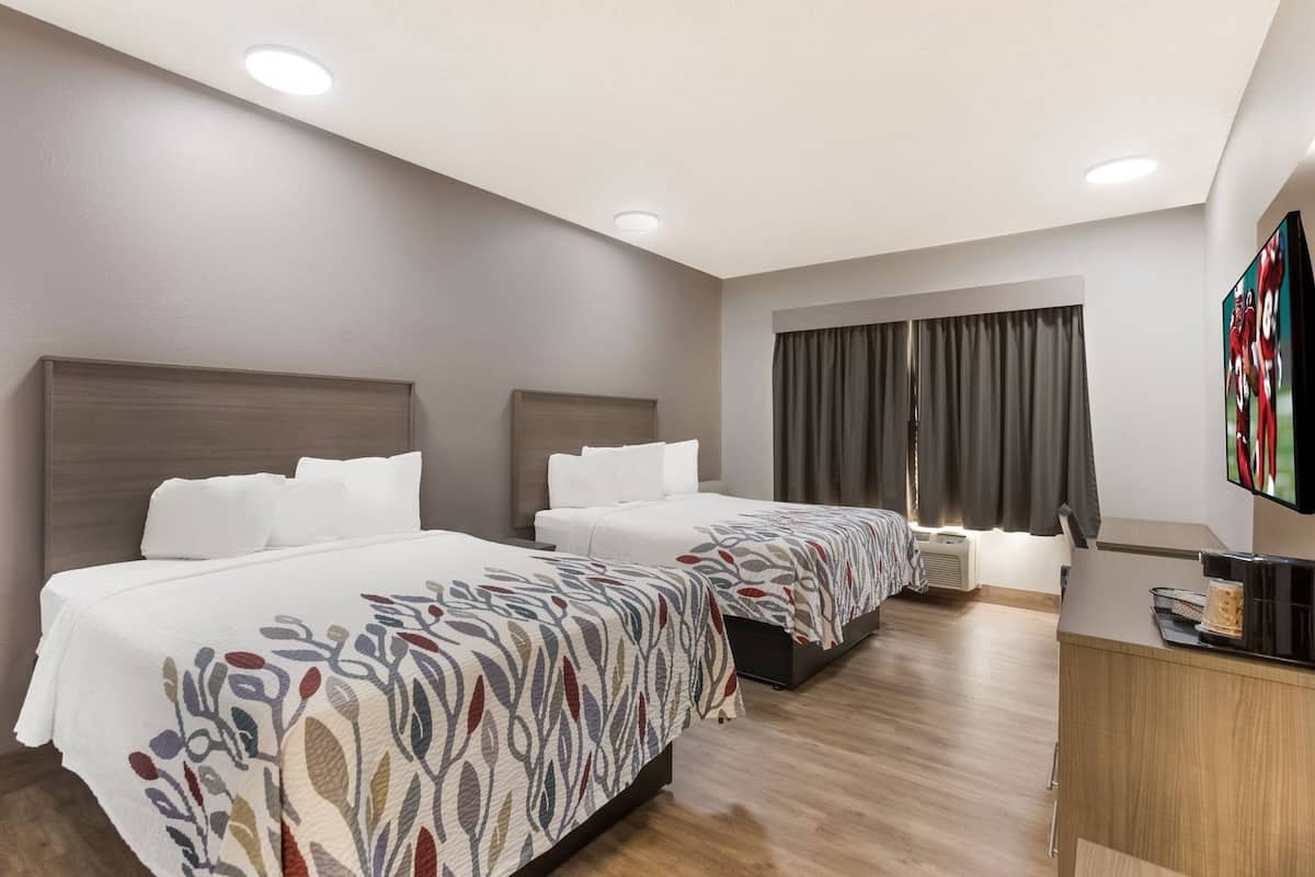 Desk, iron/ironing board, free cribs/infant beds, rollaway beds