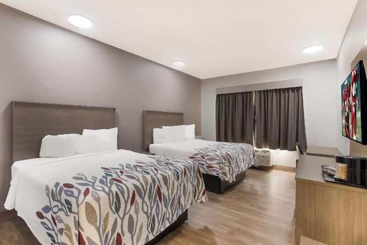 Desk, iron/ironing board, free cribs/infant beds, rollaway beds