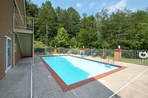 Seasonal outdoor pool, pool umbrellas, pool loungers