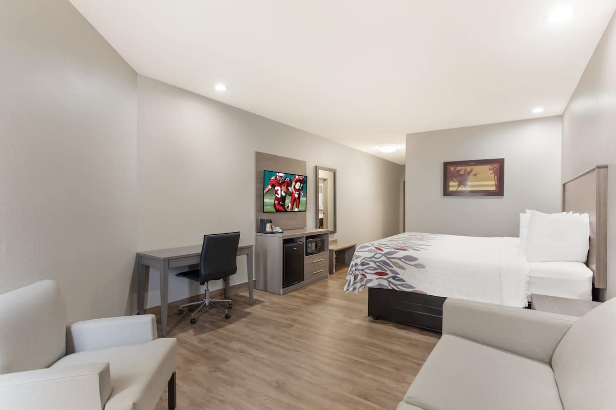 suite, 1 king bed, non smoking | desk, iron/ironing board, free cots/infant beds, rollaway beds